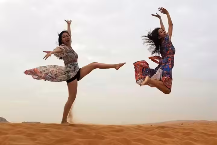 Guests enjoying a desert safari in comfortable clothing